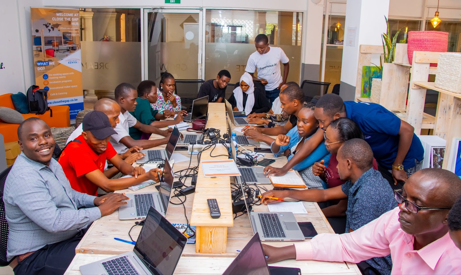 Learners using laptops during the Experience AI session.